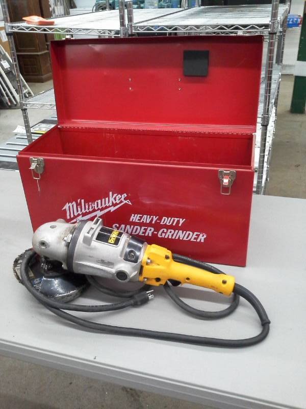 lot 591 image: DeWalt DW493 9in. Right Angle Sander with Milwaukee Tools Case