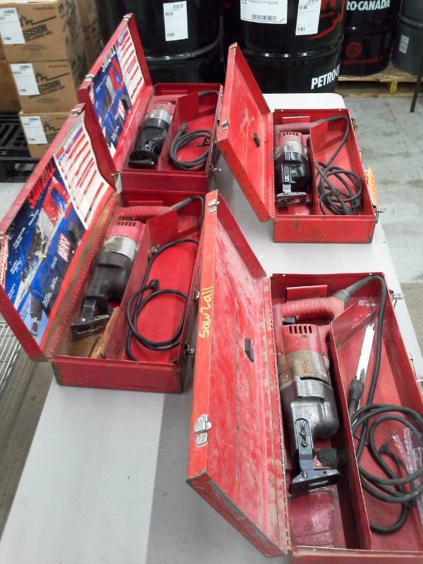 lot 605 image: Lot of 4 Milwaukee Electric Tool Corp. Heavy Duty Sawzalls with Case