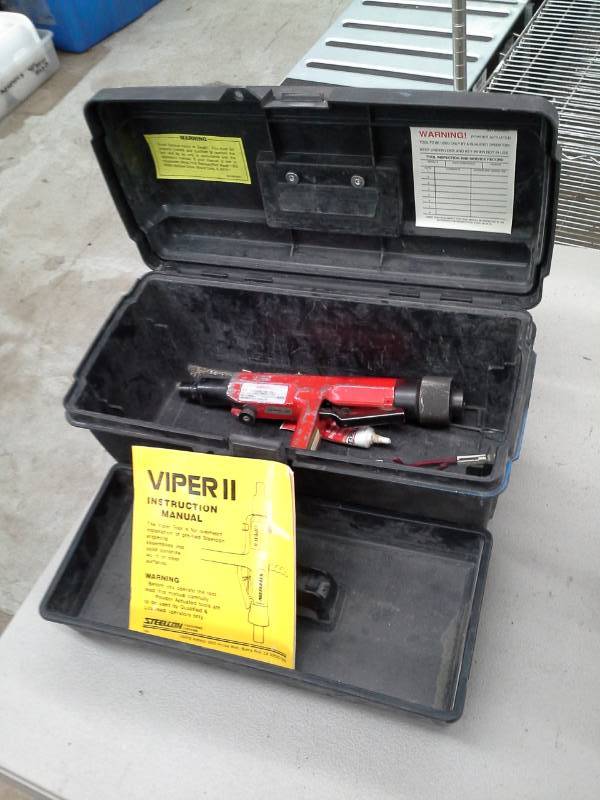 lot 677 image: Steelcon Fastening Systems Viper II Powder Actuated Fastener with Case, Manual