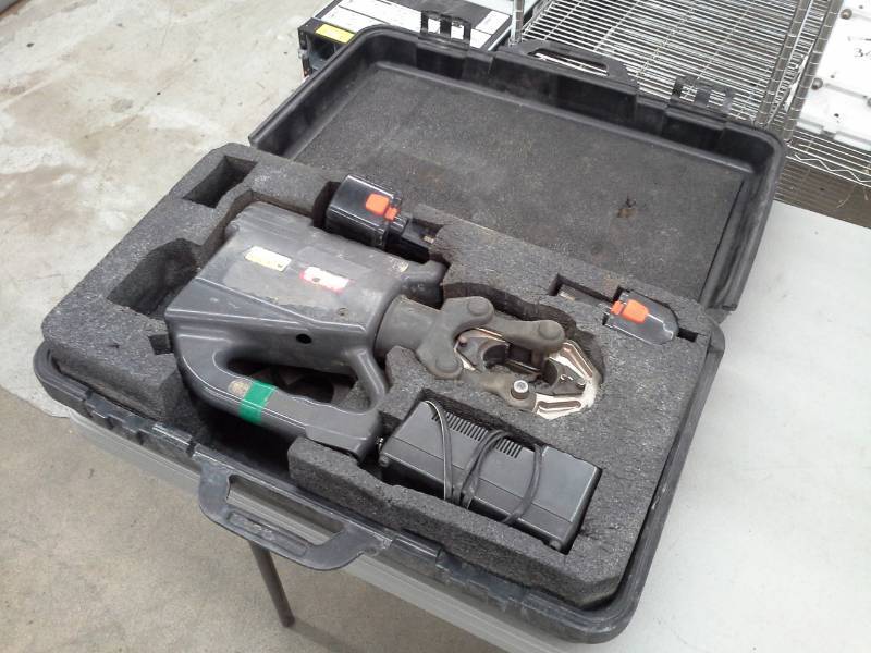 lot 707 image: Huskie Cutoff Tool with Battery, Charger, Case