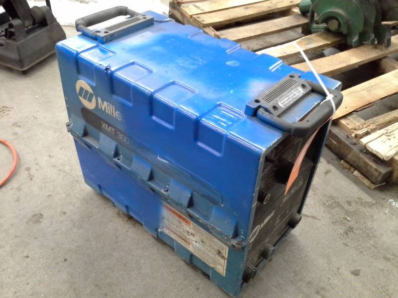 lot 520 image: Miller XMT 300 CC DC Inverter Arc Welder