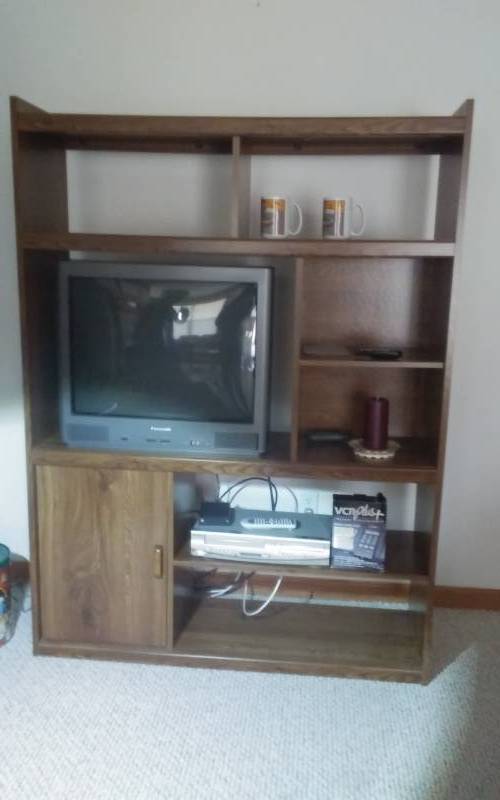 lot 9 image: Media Shelf (50x67x16) Panasonic 26 Inch TV, Sylvania DVDVCR & Other Contents