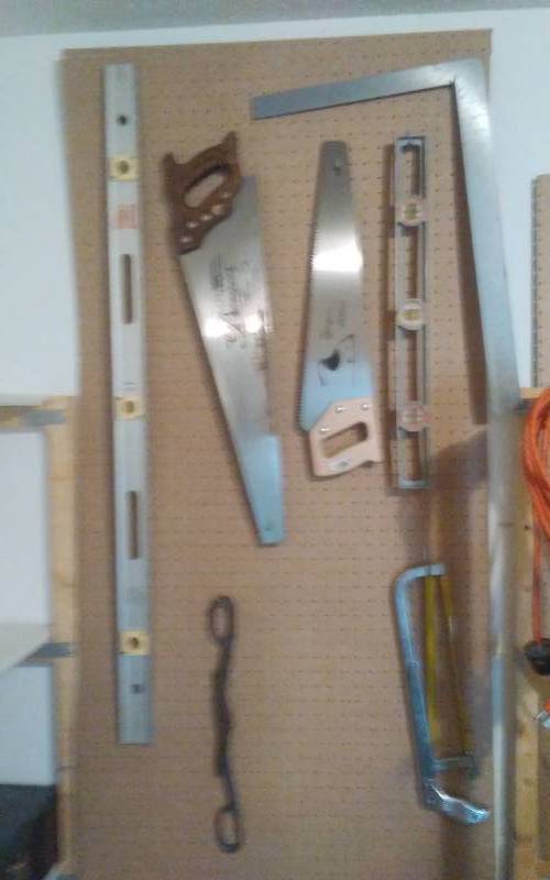 lot 44 image: Wall Of Tools, Hand Saws, Level, Square