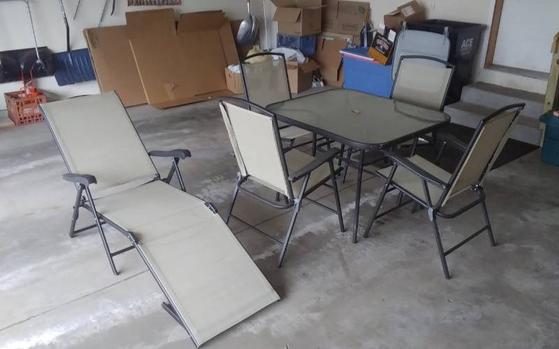lot 47 image: Glass Patio Table 35x40, 4-Folding Chairs, 1-Matching Chaise