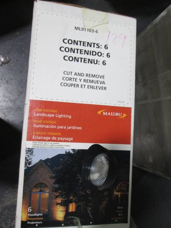 lot 129 image: Box of new Malibu landscape lightin...