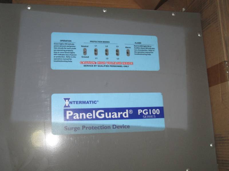 lot 57 image: Panel Guard surge protector...