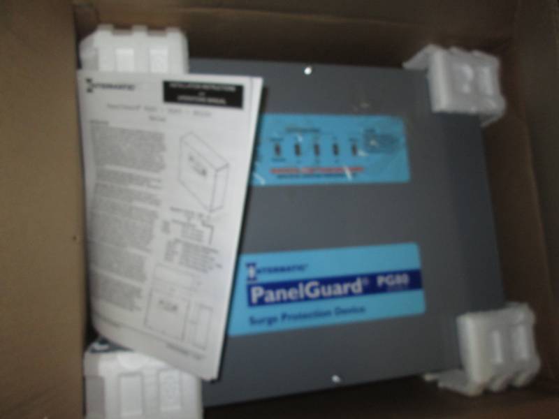 lot 132 image: Panel Guard surge protector...