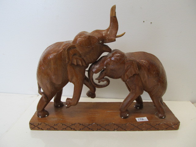 lot 172 image: Large Carved Wooden Fighting Elephant Sculpture