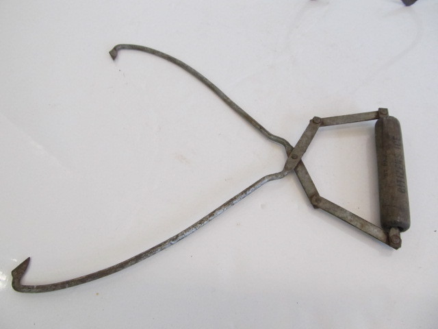 lot 189 image: 2 Antique Advertising Ice Tongs