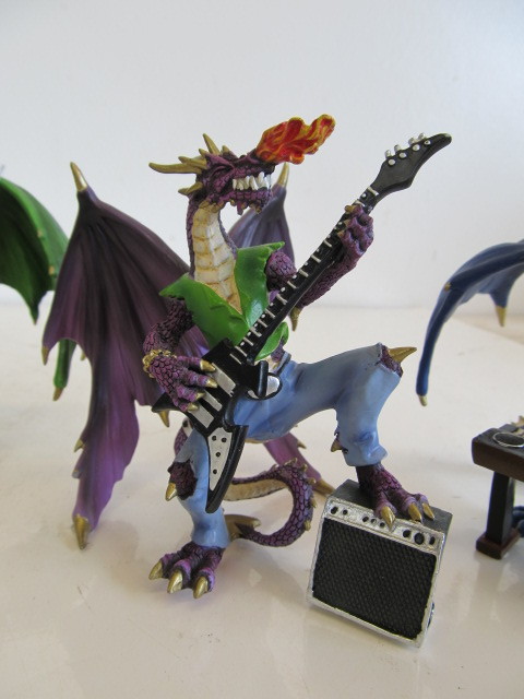 lot 182 image: The Fiery Youngbloods Dragon Band Figurines