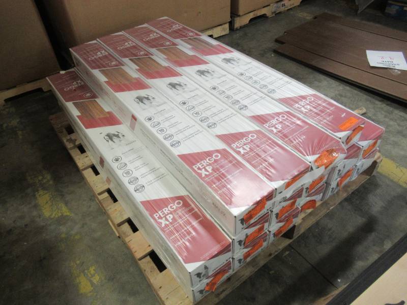 lot 61 image: Pergo XP Hawaiian Curly Koa 10 mm Thick x 4-78 in. Wide x 47-78 in. Length Laminate Flooring (13.1 sq. ft.  case) - 16 Cases