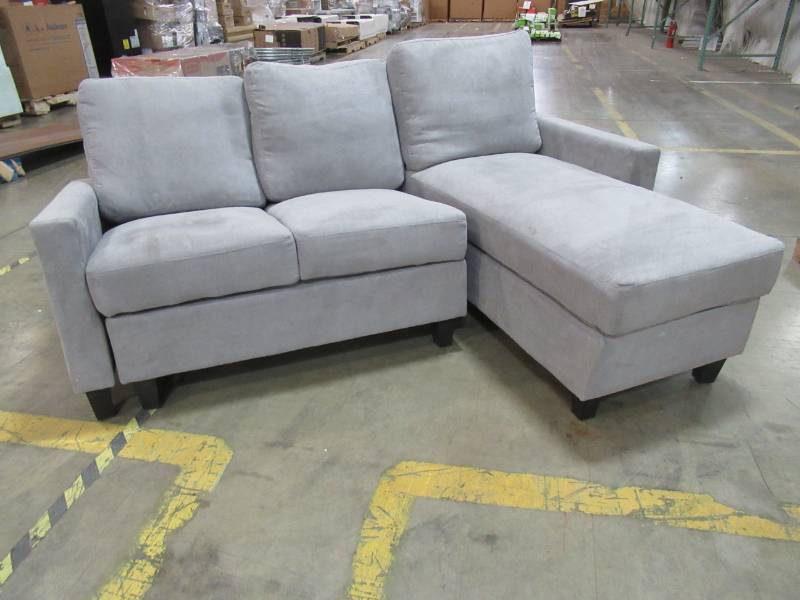 lot 93 image: Gray Alexandra Convertible Sectional, 73022-40GY - Missing Feet.