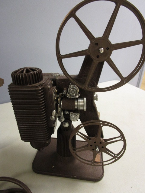 lot 328 image: VINTAGE FILM PROJECTOR