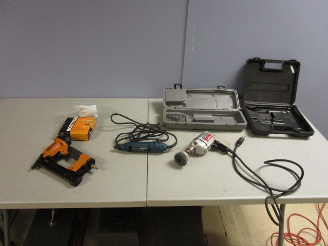 lot 312 image: PNEUMATIC STAPLE GUN, POWER CHISEL AND DRILL