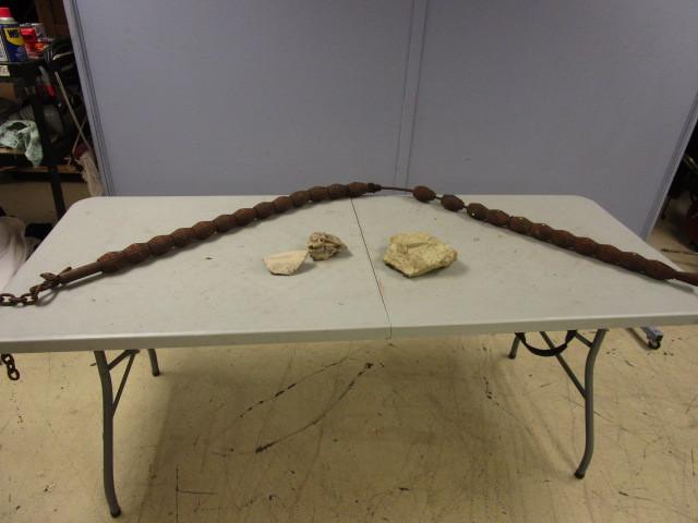 lot 424 image: VINTAGE CATTLE BACK STRETCHER AND POSSIBLE FOSSILS