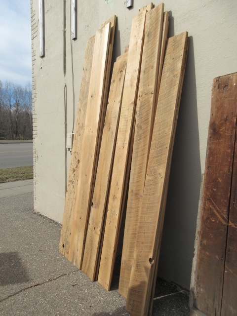 SANDED, ROUGH SAWN BROWN BOARD