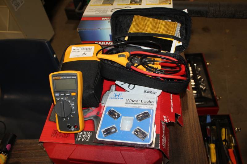lot 70 image: Honda Wheel Locks, Fluke Multimeter, Fluke Timing Light