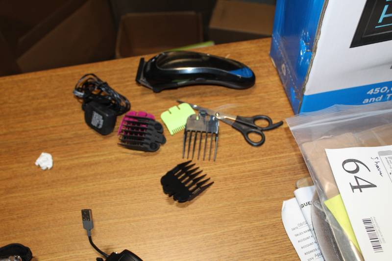 lot 64 image: Wahl Cordless Hair Trimmer Kit with Charger, Hair Guides, Scissors