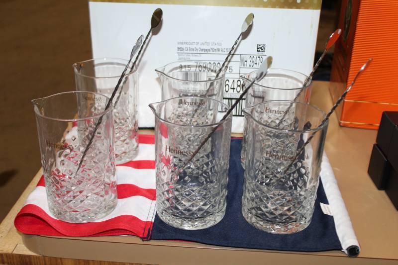 lot 114 image: Hennessy Glass Pitchers with Stainless Steel Stir Spoons