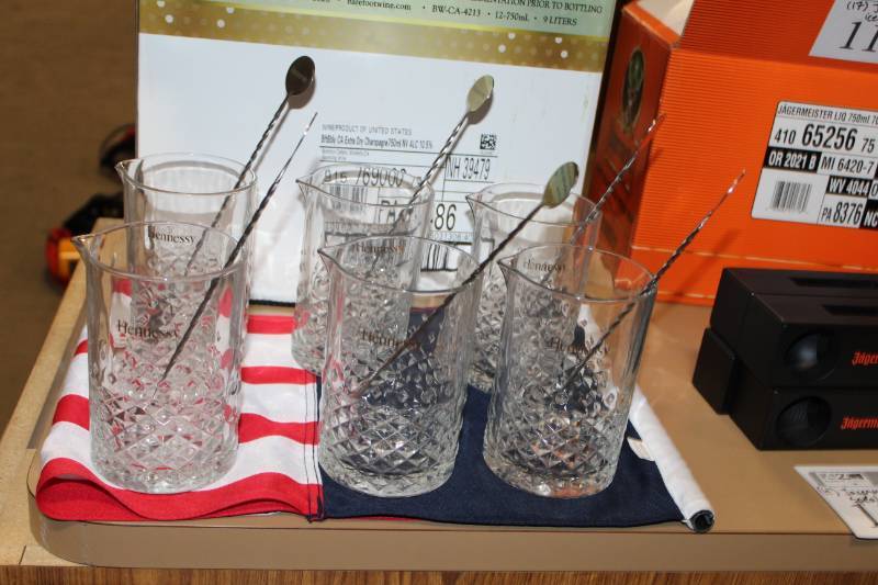 lot 115 image: Hennessy Glass Pitchers with Stainless Steel Stir Spoons