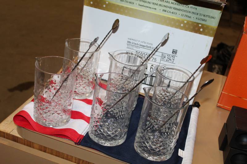 lot 116 image: Hennessy Glass Pitchers with Stainless Steel Stir Spoons