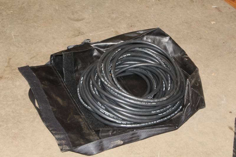lot 23 image: Utility Air Hose with Carry Bag