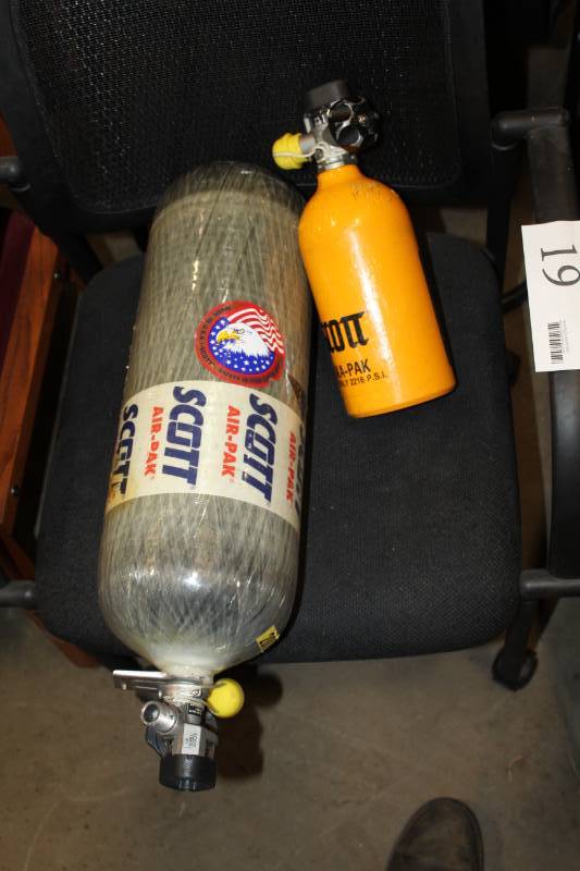 lot 19 image: Scott Air-Pak Safety Air 60 Minute Carbon Fiber Air Bottles and Ska-Pak 5 Minute Spare Bottles
