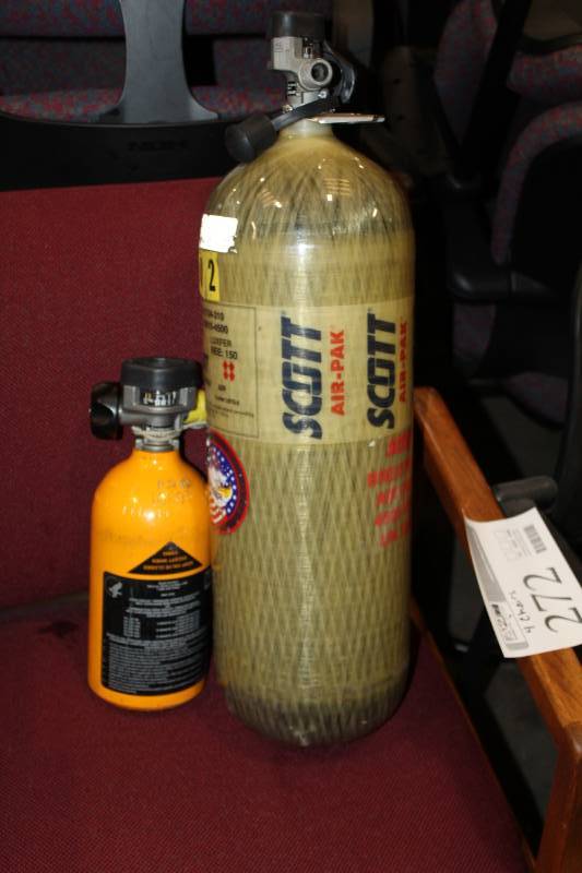lot 20 image: Scott Air-Pak Safety Air 60 Minute Carbon Fiber Air Bottles and Ska-Pak 5 Minute Spare Bottles