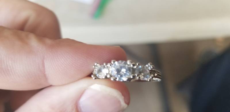 lot 286 image: Silver Tone Ring, with (7) Diamonds