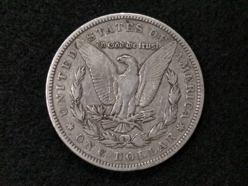 lot 4 image: 1885 Morgan Silver Dollar...