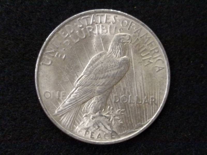lot 25 image: 1922 Peace Silver Dollar...