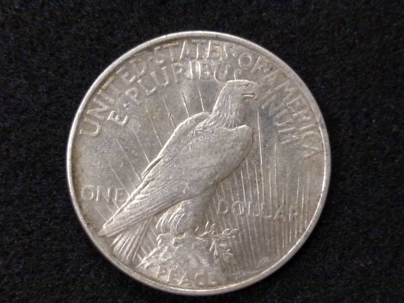 lot 28 image: 1922 Peace Silver Dollar...