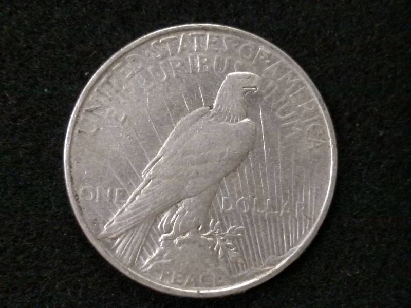 lot 32 image: 1922 D Peace Silver Dollar...