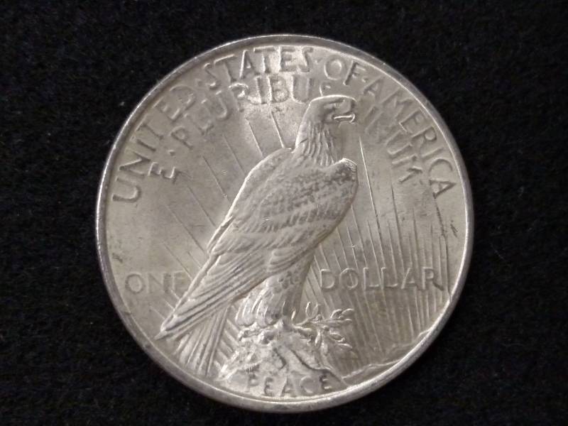 lot 38 image: 1923 Peace Silver Dollar...