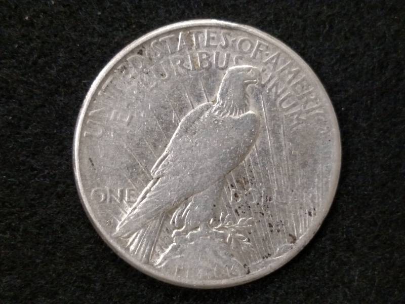 lot 42 image: 1923 S Peace Silver Dollar...