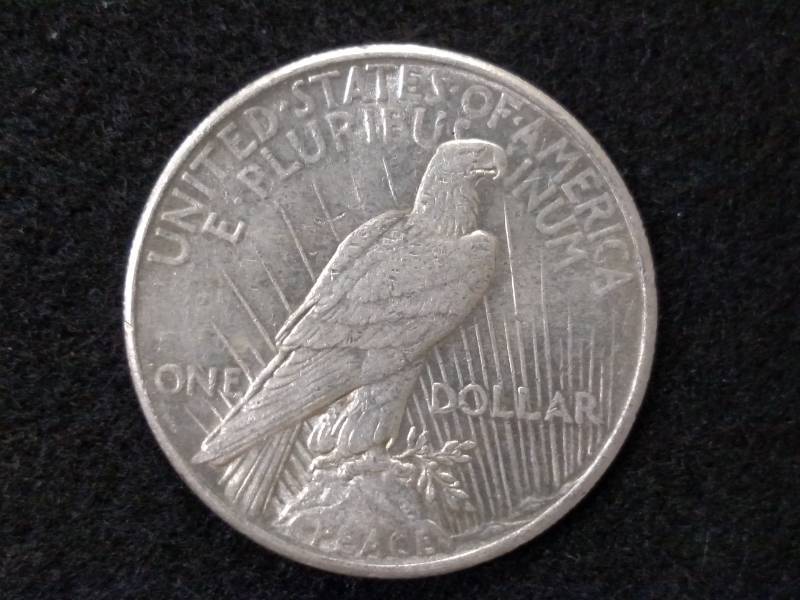 lot 47 image: 1925 Peace Silver Dollar...