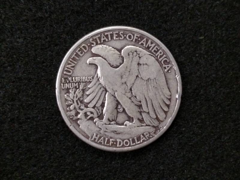 lot 61 image: 1942 Walking Liberty Silver Half Do...