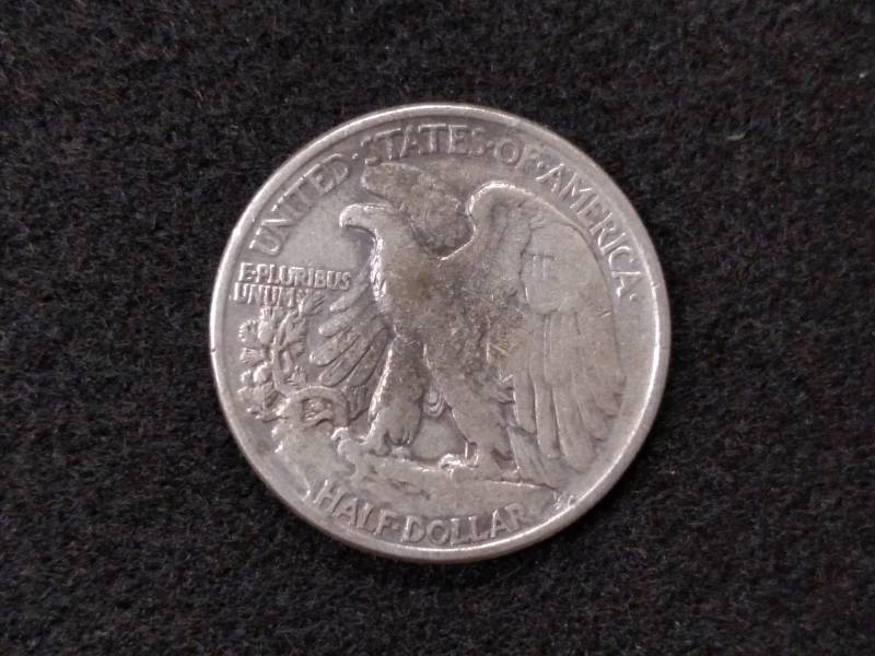 lot 66 image: 1945 Walking Liberty Silver Half Do...