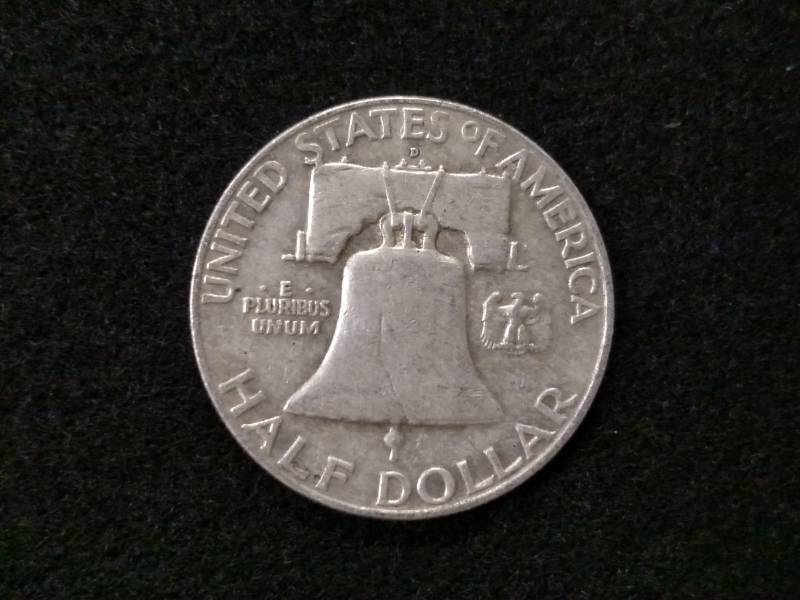 lot 79 image: 1959 D Franklin Silver Half Dollar...