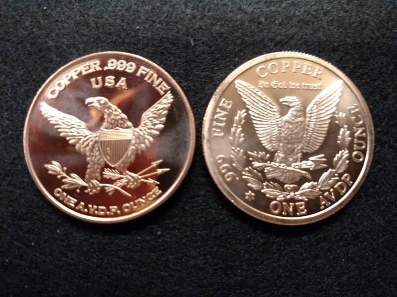 lot 94 image: (2) One Ounce .999 Copper Coins...