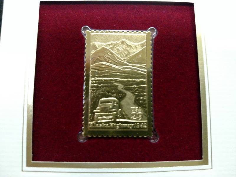 lot 111 image: Alaska Highway Gold Stamp Replica, ...