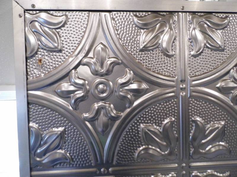 Tin Ceiling Mounted on Wood