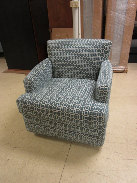 ACCENT CHAIR THAT ROCKS AND SWIVELS