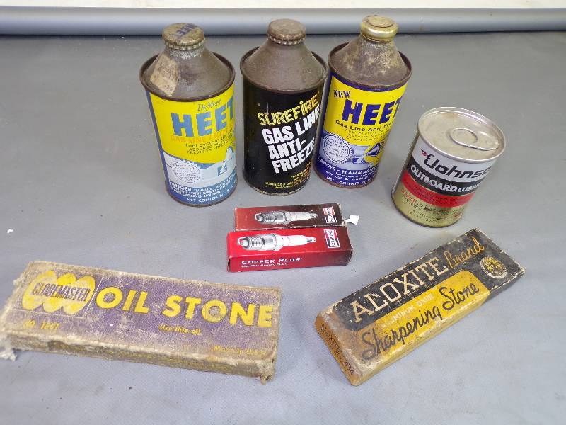 lot 82 image: Sharpening Stones, Cans of Heet, Outboard Lube and Spark Plugs
