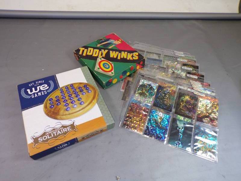 lot 89 image: Wood Solitaire and Tiddly Winks Games and Boris 3 All Prism Complete Card Set