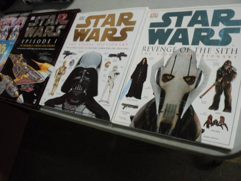lot 31 image: 3 Star Wars Hard Cover Books and Bi...