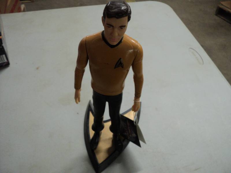 lot 47 image: Star Trek James T Kirk on stand...