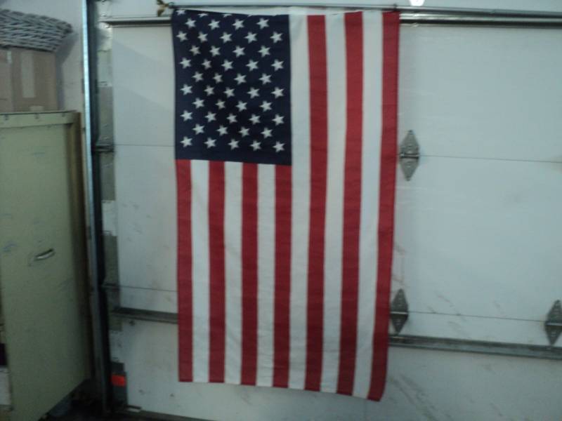 lot 205 image: US Flag with Pole...