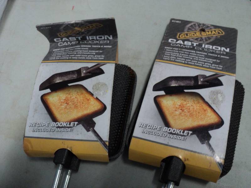 lot 249 image: Set of 2 Guidesman Cast Iron Camp C...