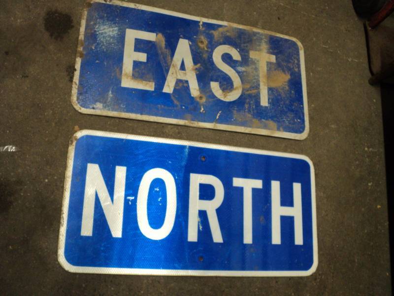 lot 254 image: East and North 12 x 24 signs...